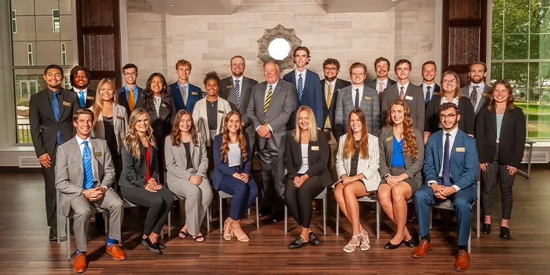 members of the student government pose for a group photo with chancellor kristensen